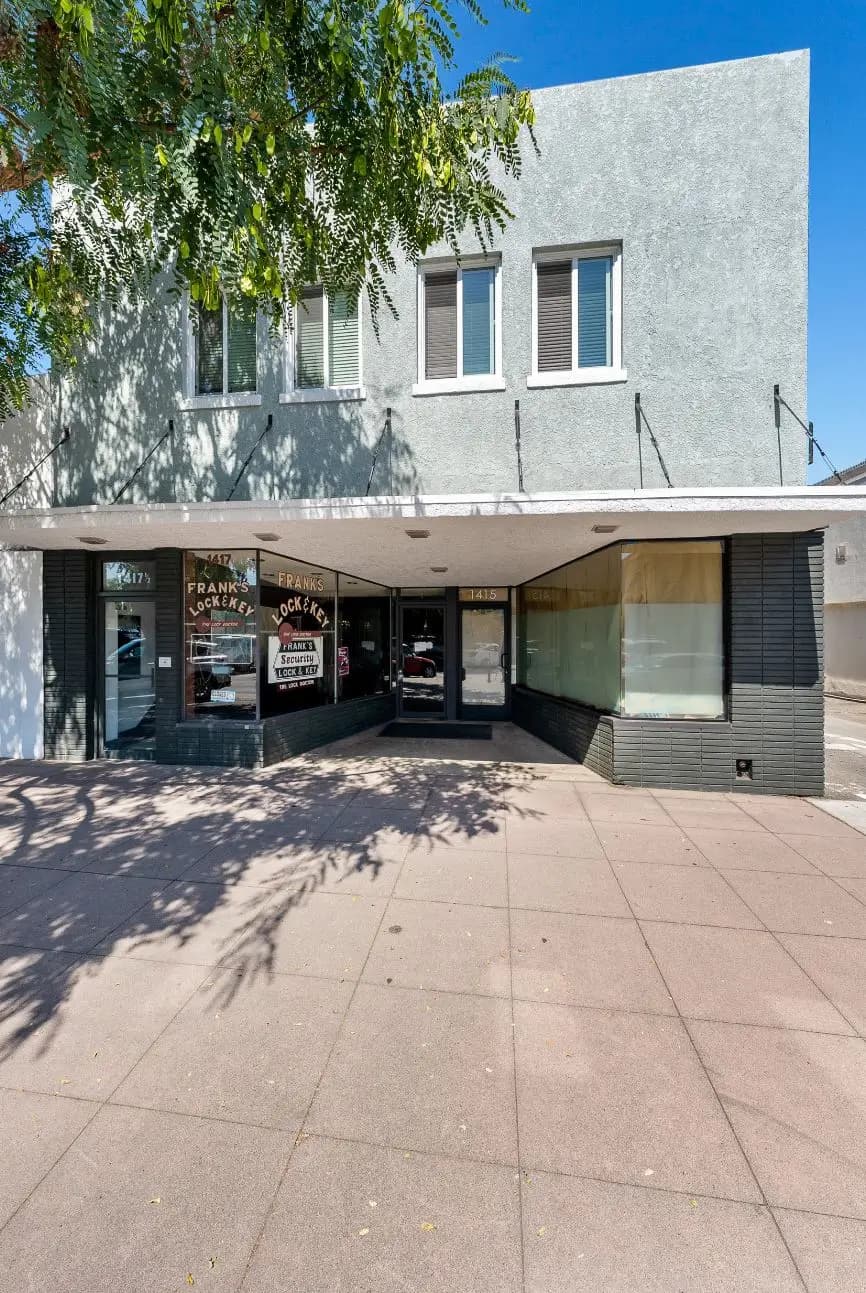 Glass storefront entrance to the Marcelina Lofts building in Old Torrance, California